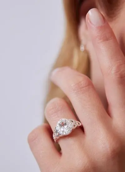 Sterling Silver Trinity Knot Halo Ring with White Topaz